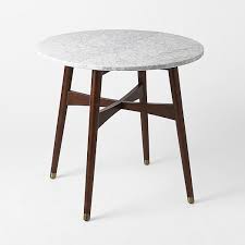 Use a bistro table and chairs to create a small dining area on a front porch or apartment terrace. Reeve Mid Century Bistro Table Bistro Table Contemporary Dining Table Kitchen Table Marble