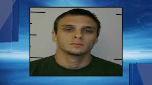 SWAT teams raid Guthrie Apartment, find drugs and guns