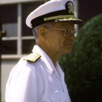 Signalman 1st Class Christopher Holcombe from Chesapeake, Va. uses a signal  light to communicate with the guided missile destroyer USS Arleigh Burke  (DDG 51) from the signal bridge of the guided missile