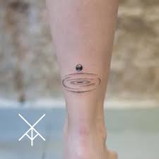 What was the first tattoo i ever got? A Small Planet And A Black Hole Tattooed On The Right Calf Neck Tattoo Black Hole Tattoo Tattoos