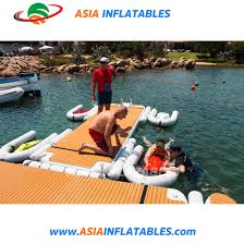 Our harbor and dinghy dock are full of inflatable boats, all of which will be pulled out of the water for no matter how thick with growth your bottom may be after spending the summer in the water is there any way to remove anti fouling paint from the bottom of an inflatable without damaging the material? China Inflatable C Dock Jet Ski Parking Boat Dock Deck For Paddle Board China Inflatable C Dock And Inflatable Deck For Paddle Board Price