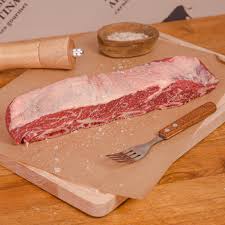 Asado combined with offal is quite popular and you will also find that bbq short ribs asado de tira has become a favorite dish on many restaurant menus. Tira De Asado Novillo Raza Angus Deliargentina