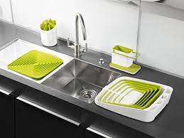 The no suction cup, no fall sponge holder. Joseph Joseph Sink Caddy Kitchen Soap And Sponge Holder White And Green Savor Health