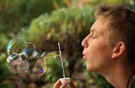 Blowing rainbow bubbles stock photo. Image of teen, blow