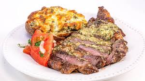 24 of 33 pan broiled steak with bourbon sauce Sirloin Or Ribeye Steak Dinner Recipe With Spinach Artichoke Baked Potatoes And Tomato Salad Rachael Ray Show