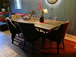 It is decorated with a rectangular mirror and a round wall art this open dining room showcases a dark wood dining table surrounded with white chairs and lighted by black dome pendants. Medieval Solid Wood Dining Table Made Of Oak With Steel Fittings Loftmarkt