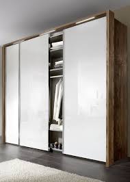 Nolte Evena Wood Doors Sliding Wardrobe Slidingwardrobe Wardrobe Design Bedroom Sliding Wardrobe Bedroom Cupboard Designs