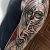 Forearm day of the dead woman tattoo. 1