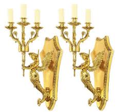These gorgeous candle holders are available in a wide array of colours, styles and designs so that you can create a soft glow in your home while making a style statement. Casa Padrino Baroque Wall Candle Holder Set Gold 20 X 20 X H 50 Cm Baroque Decoration Accessories