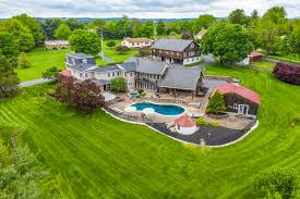 The most common way is to put two nouns together (noun + noun); House For Sale Live Work Play Farm Compound Near Collegeville