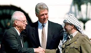 From bullets to ballots, history in a handshake. Read Remembering The Arafat Rabin Handshake Online
