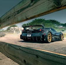 Pagani Huayra Bc In Exposed Carbon Fiber W A Blue White Central Stripe And Gold Wheels Photo Taken By Folkphotography O Pagani Pagani Huayra Super Cars