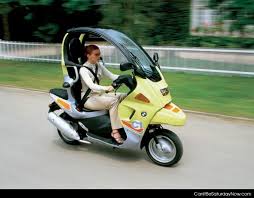 Covered Scooter On Canitbesaturdaynow Com Bmw C1 Bmw Scooter Motor Scooters