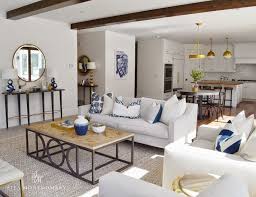 Amazing Transitional Living Room Features Ceiling Dotted With Pot Lights And Rustic W Living Room Furniture Layout Rectangular Living Rooms Living Room Pillows