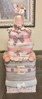 Because it is filled with sweet, charming and down right adorable baby shower diaper cakes from so many amazing readers. Diaper Cake Woodland Deer Theme Girl Baby Shower 240 Diapers Woodland Baby Girl Diaper Cakes Girl Baby Girl Diaper Cake