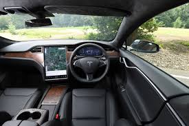Tesla has updated the model s front seats with a sleeker and thinner design that facilitates better use of interior cabin space. Tesla Model S Interior Comfort Drivingelectric
