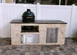 big green egg in custom outdoor kitchen