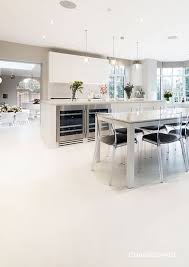 White Resin Flooring Complements The Seamless Design Of An Open Plan Living Space Www Chasingspace Co Uk Polished Concrete Flooring Flooring Polished Concrete