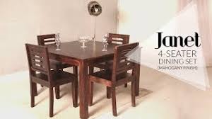 We have dining table sets available in a range of materials to give a modern, retro or more traditional look. Dining Table Set Janet 4 Seater Dining Table Set In Mahogany Finish At Wooden Street Youtube