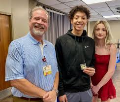 Ada High Students of the Month Devon MacCollister & Caoimhe Gurley with Doug  Crowson