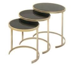 Modern round coffee table will enhance the looks of any home. Litton Lane Set Of 3 Black Glass Round Nesting Side Tables With Gold Iron Legs Ebay