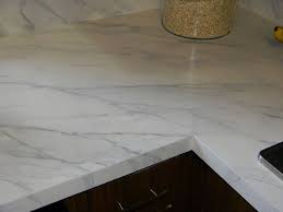 Faux painting can make concrete look like marble. White Marble Looking Granite Novocom Top