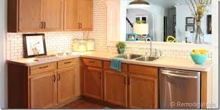 Remodelaholic 25 Great Kitchen Backsplash Ideas Oak Kitchen Cabinets Oak Kitchen Kitchen Remodel