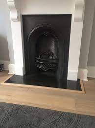 Cover the edge of the tiles with metal edging. Edging For Flooring Around Fireplace Mumsnet