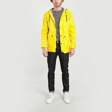 Cuir de grande qualité couleur jaune un tissu à motifs bleu, petit bateau 2 poches pour les cartes de crédit, bancaire de taille standard plus une grande poche pour les documents type papier identité. Cire Iconique Jaune Petit Bateau L Exception