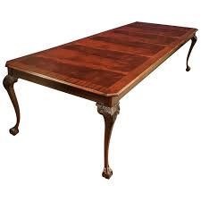 China is lighted, has a mirrored back and features glass doors with decorative mullions. Custom Chippendale Style Ball And Claw Mahogany Dining Table By Leighton Hall For Sale At 1stdibs