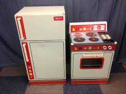 Cartoon kitchen set of apron, knives, oven mitts, grill pan with tuna steak, tunav steak with. Pin On 70 S 80 S My Childhood
