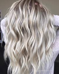 The balayaged hair creates a near monochromatic this hair shows a sharp transition from ash blonde roots that fade into lighter and shinny blonde tone. 25 Beach Blonde Hair Ideas From Instagram Hair Styles Artistic Hair Beach Blonde Hair