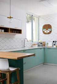 9 Green Kitchens That Are Positively On Trend Hunker Green Kitchen Olive Green Kitchen Kitchen Cabinet Trends