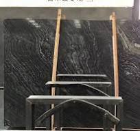 Losa de mármol de piedra de bosque de madera negra con ...