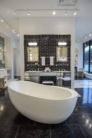 Faucets Fittings Tubs And Surfaces For Today S Kitchen And Bath Kitchen And Bath Showroom Modern Bathroom Modern Bathroom Design