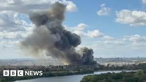 Huge waste facility fire shuts Tube and train lines