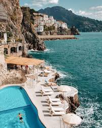A late 19th century liberty style hotel with a stunning private beach & bar, nestled into the amalfi coast cliffside. Hotel Santa Caterina On Instagram A Morning Swim Is Surely The Finest Way To Start The Day Photo In 2021 Almafi Coast Italy Amalfi Coast Hotels And Resorts