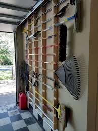 Garagestorage In 2020 Garden Tool Rack Diy Garage Storage Garage Organization