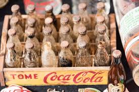 Coca cola coke germany 100 celebration 50s 60s 70s contour bottles love machine. Collecting Old Coca Cola Bottles Lovetoknow