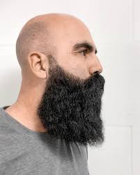This men's hairstyle has a thick viking beard on the bottom that complements the neat sweep on top. Best Viking Hairstyles For Men In 2021