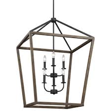 The Gannet 2 Tier Chandelier By Feiss Features A Double Candelabra And Stem Setup Finished In Antique Forged Iron Chandelier Canopy Lights Chandelier Lighting