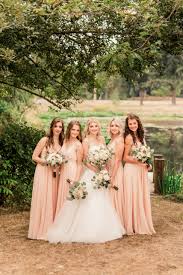 Bride And Bridesmaids Brides And Bridesmaids Wedding Flowers Blush Bridesmaid Dresses