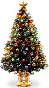 We all love decorating our christmas trees, but circling around the tree over and over again making the lights perfect can be such a hassle. Buy National Tree Company Pre Lit Artificial Christmas Tree Flocked With Mixed Decorations And Multi Color Lights Great For Table Centerpieces Or Other Holiday Decor Fiber Optic Fireworks 4 Ft