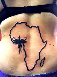Instead of having a normal africa continent tattoo you can have the map filled with african wildlife. Map Of Africa Tattoo With A Tribal Phoenix Represantation Over Ghana African Tattoo Africa Tattoos Tattoos