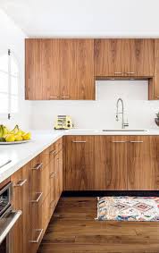 Walnut Kitchen Cabinetry With White Counter And Backsplash Mid Century Modern Cabin Design Modern Kitchen Design Mid Century Modern Kitchen Modern Kitchen