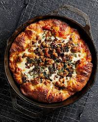 Cast Iron Skillet Pizza Delivers The Crunchy Crust We Crave In 2020 Cast Iron Skillet Pizza Skillet Pizza Cast Iron Recipes