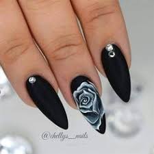 In this video naio nails show us how to create a visually stunning stiletto nail with a rose design. Black Rose My Blog