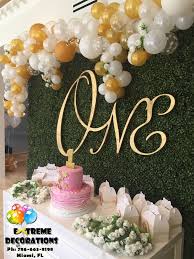 Birthday Ideas In Miami For Adults First Birthday Party Decorations Irregular Balloon Arch Classy And Sophisticated Hedge Bac First Birthday Party Decorations Party Decorations Party Balloons