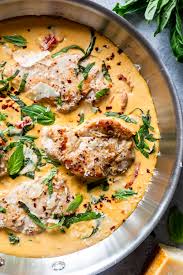 No matter which direction you go in, you're going to want to start with the thickest, fattiest. Creamy Basil Skillet Pork Chops