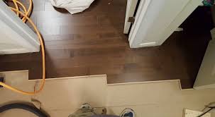 The treatment does away with segmented spaces and instead allows the two flooring materials to meet and even mingle, according. Setting Up Long Runs Of Hardwood Flooring Where To Square From Home Improvement Stack Exchange
